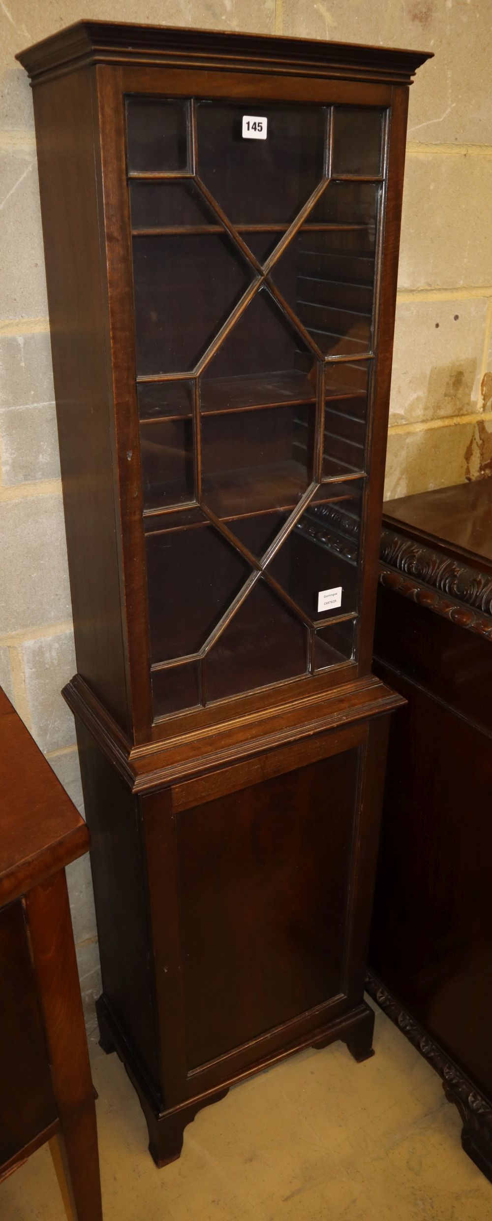 A Georgian style mahogany slender bookcase, W.45cm, D.29cm, H.168cm